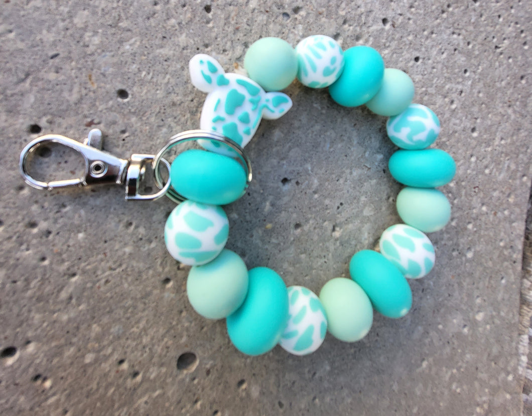 Ollie Cow in Turquoise